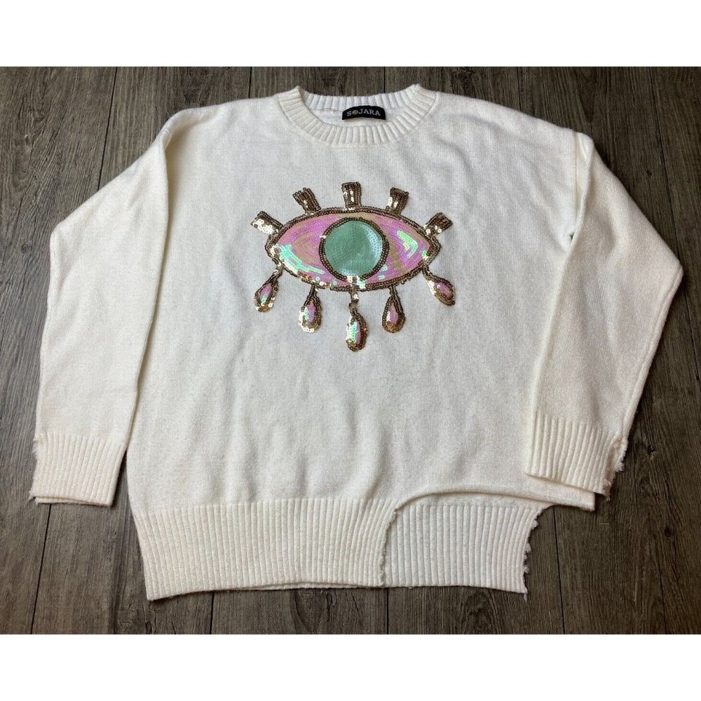SOJARA Women's Sequin Eye Appliqué  on White Distressed Cotton Blend Sweater M